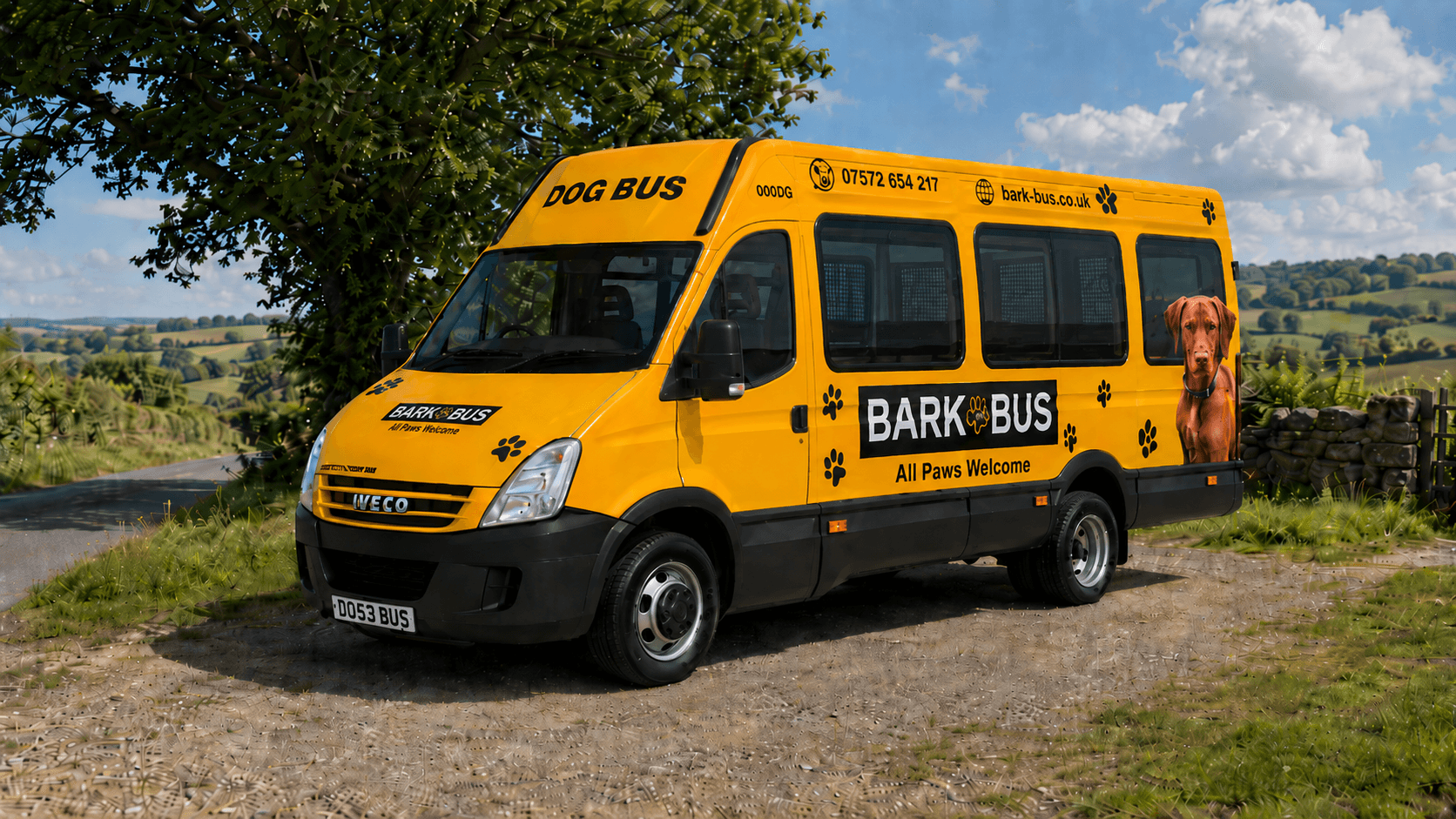 The Bark Bus — a yellow dog-adventure minibus parked on a country lane with rolling Lancashire hills behind