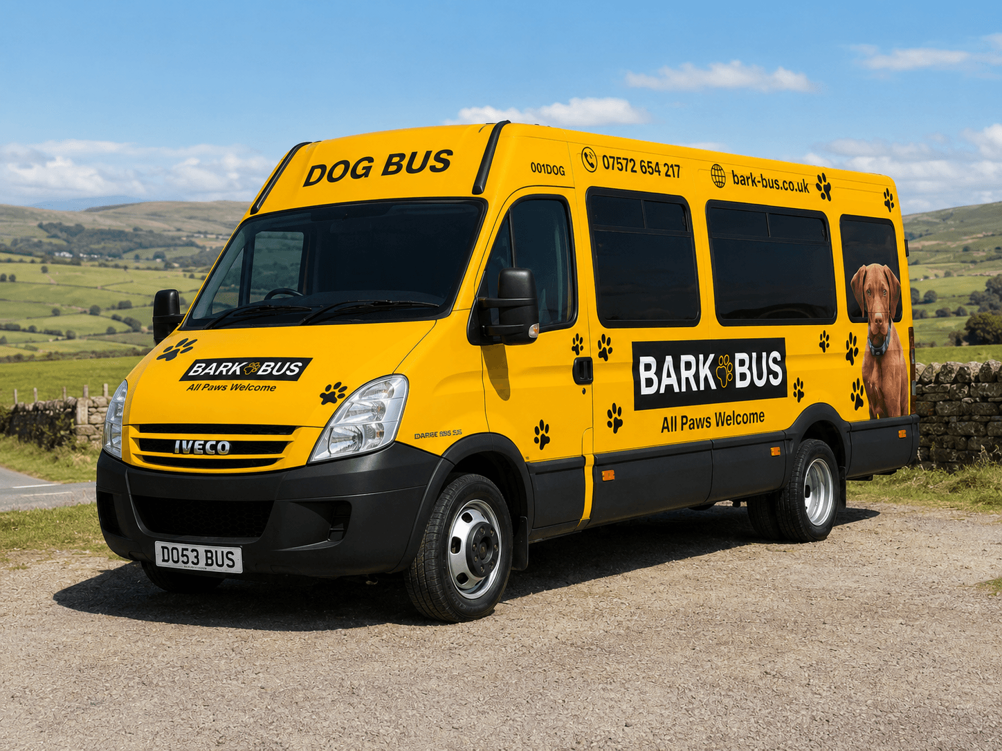 Bark Bus from the front three-quarter, parked on a hilltop track with the Lancashire fells behind